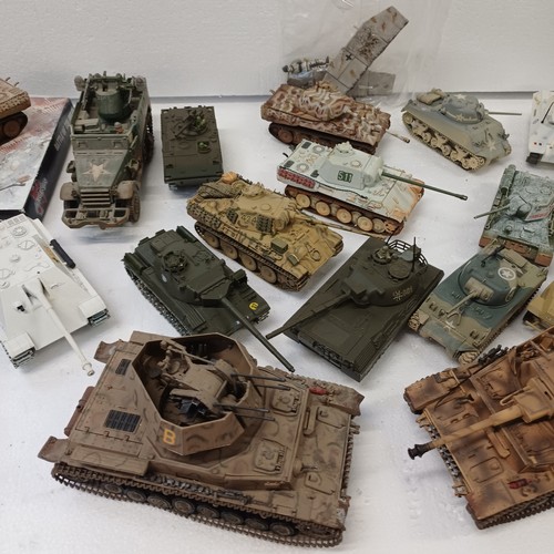 A collection of model tanks, including Corgi, etc.