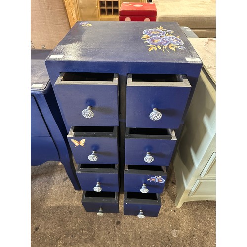 3036 - A blue floral print eight drawer chest