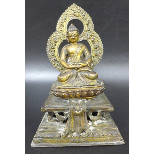 A 17th Century Eastern gilt bronze Tibetan Buddha in meditative lotus ...