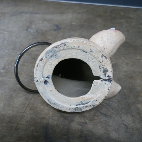 5030 - A cast metal pig head with metal ring *This lot is subject to VAT