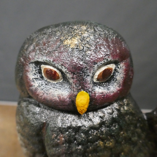 5031 - A cast metal owl doorstop *This lot is subject to VAT