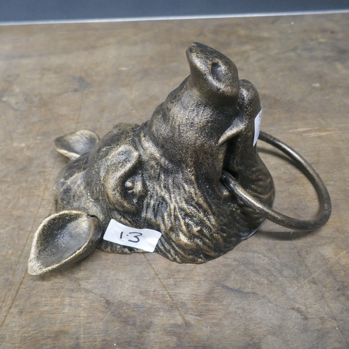 5046 - A cast metal boars head with a metal ring *This lot is subject to VAT