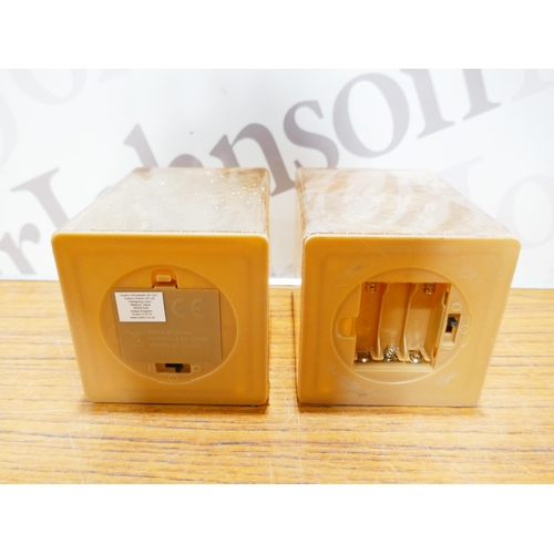 6060 - Six Evergreen LED glass cubes, (382-99,100) *This lot is subject to VAT