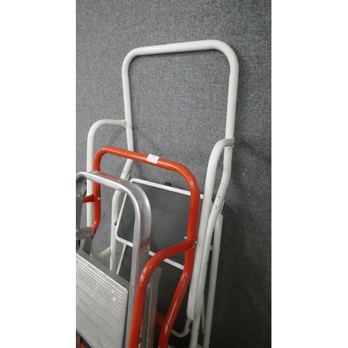A 3-rung step ladder and 2 sets of safety step