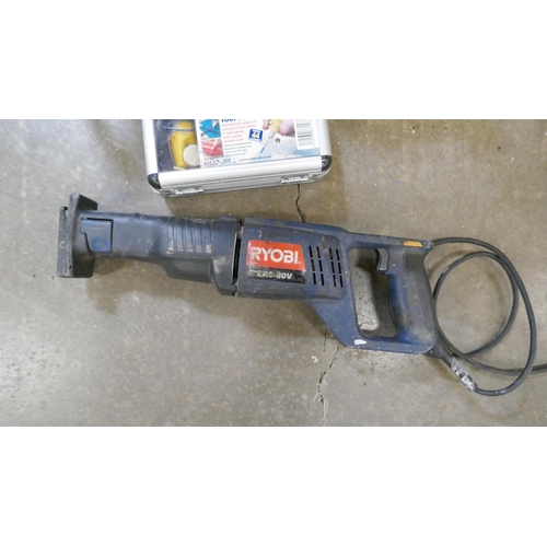 A Workmate modified with a tray, a DeWalt 240V site radio a Rotacraft ...