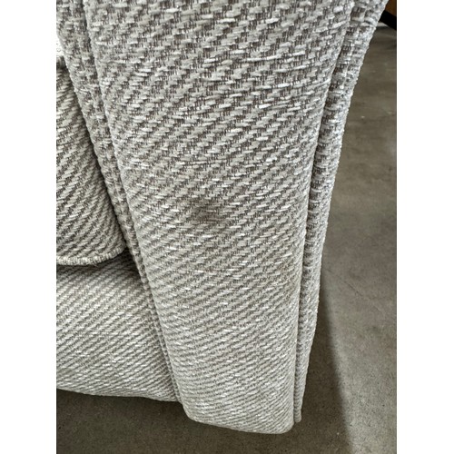 3360 - An oatmeal fabric two seater sofa