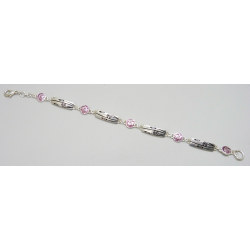 7001 - A white metal and enamel Art Nouveau Glasgow Rose design bracelet, attributed to Malcolm Gray (unmar... 