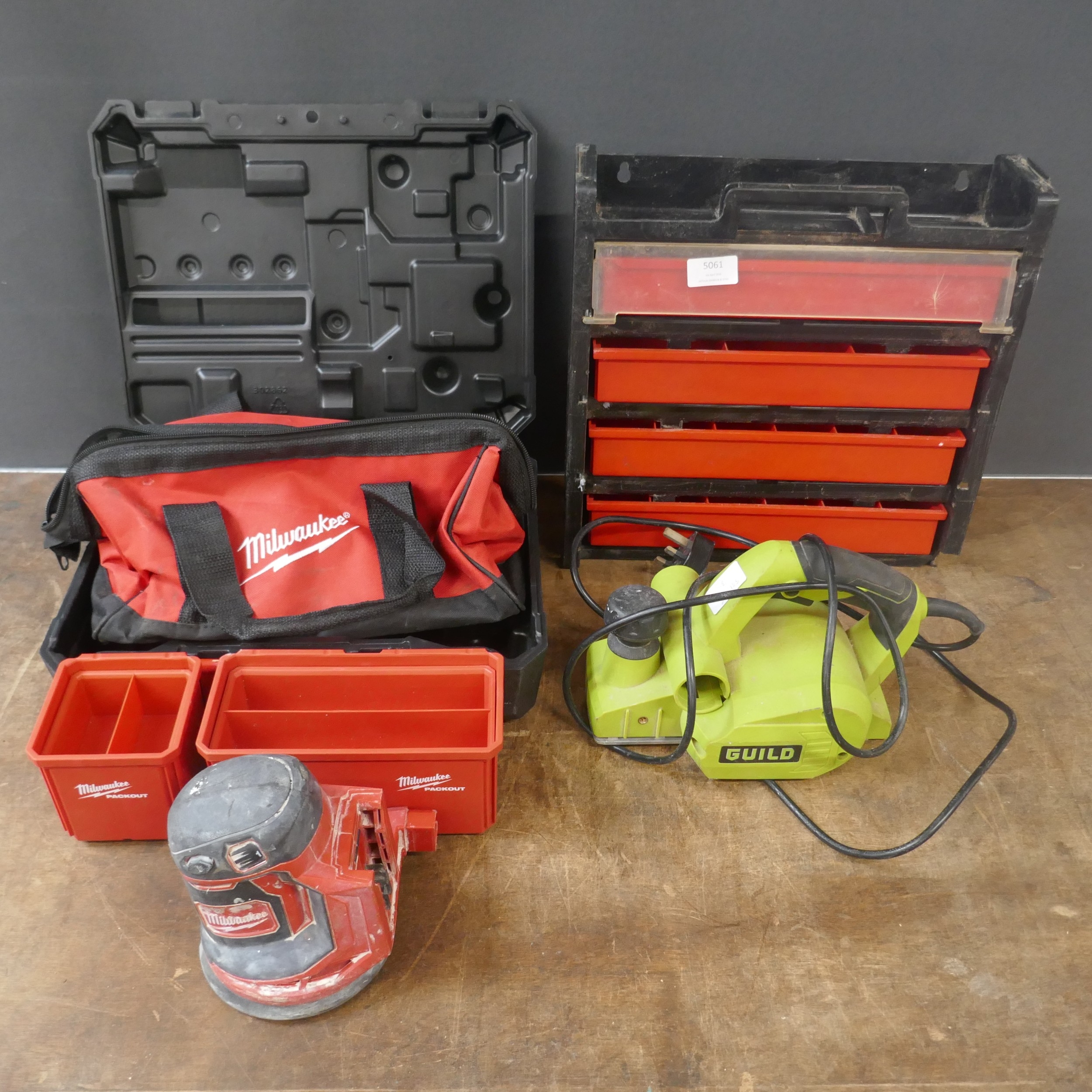 A Milwaukee pack out tray, organiser tray and Guild PPL650G 240V planer