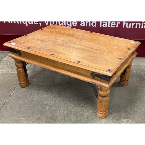 An Indian Thakat and metal mounted coffee table
