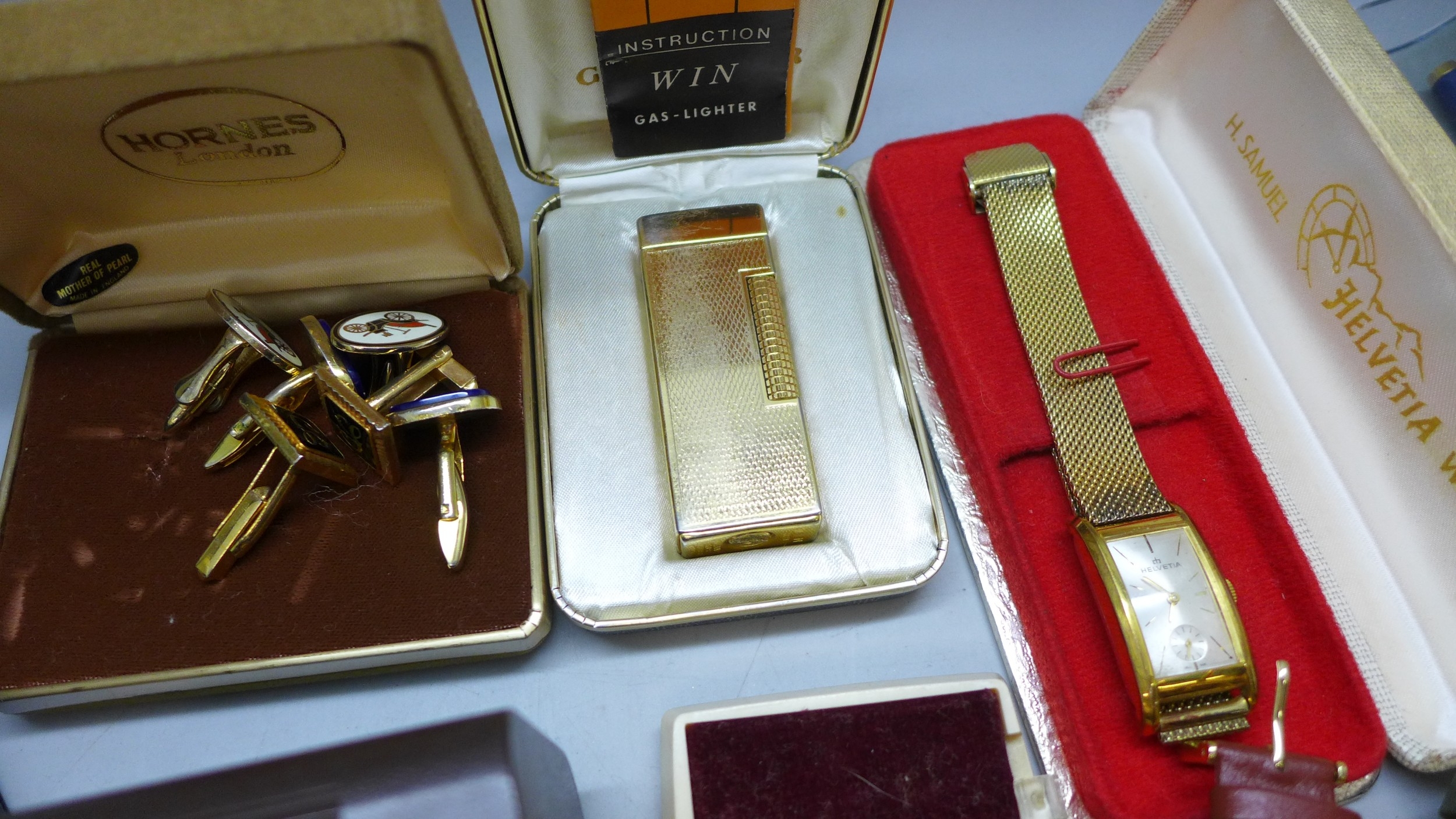 A collection of assorted items including a Wingmaster wristwatch, a ...