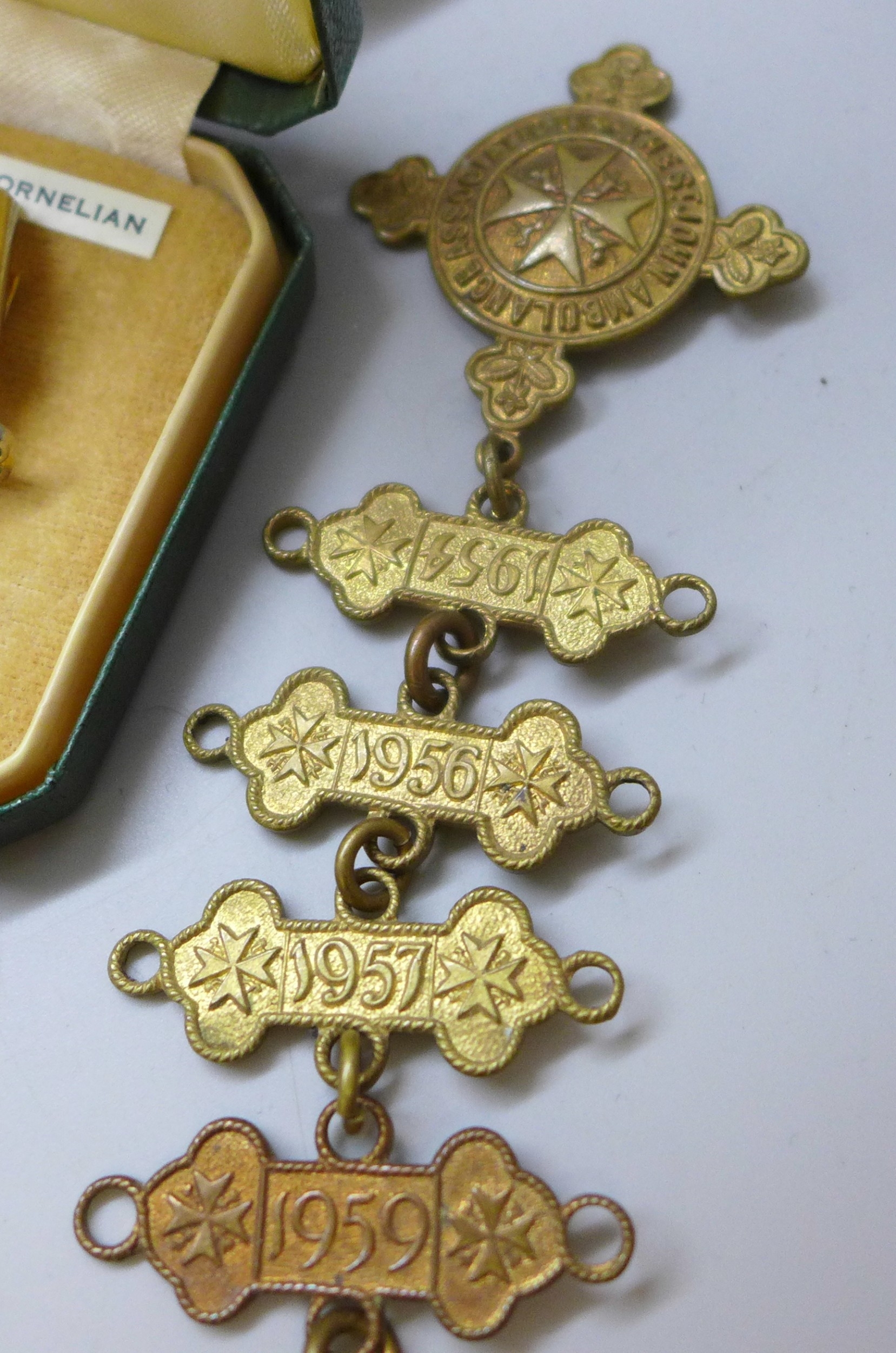 A collection of assorted items including a Wingmaster wristwatch, a ...