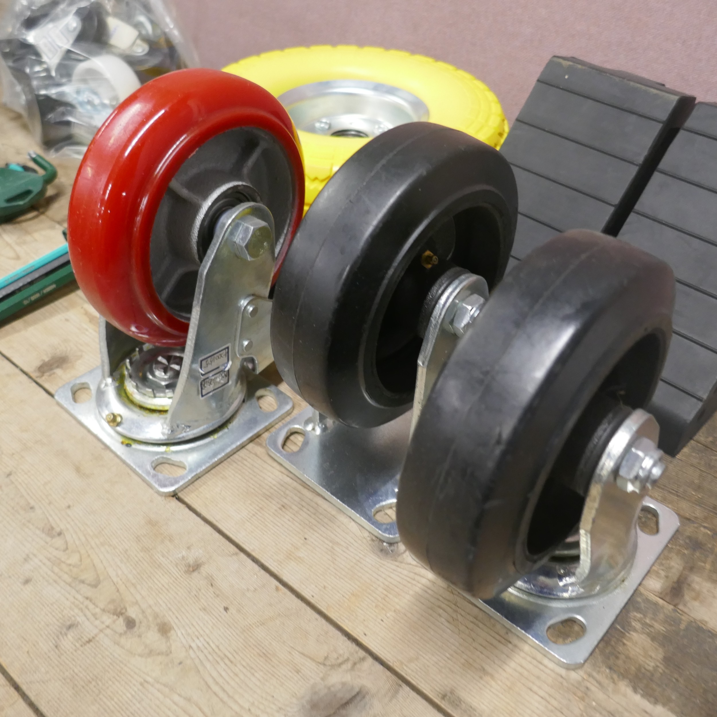 A box of assorted trolley wheels and a pneumatic wheel and 3 wheel ...