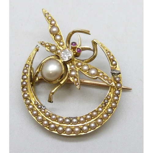 7001 - An early 20th Century yellow metal crescent brooch with insect detail, with seed pearls, diamond and... 