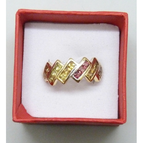 7007 - A TGGC silver gilt rainbow sapphire ring, N