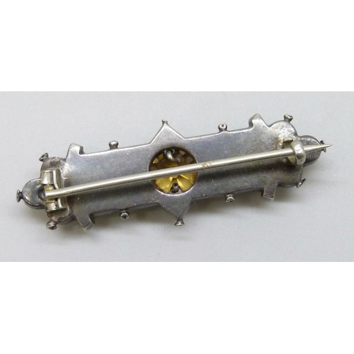 7047 - A Victorian Scottish white metal, hardstone and citrine bar brooch, tests as silver, 4.6cm