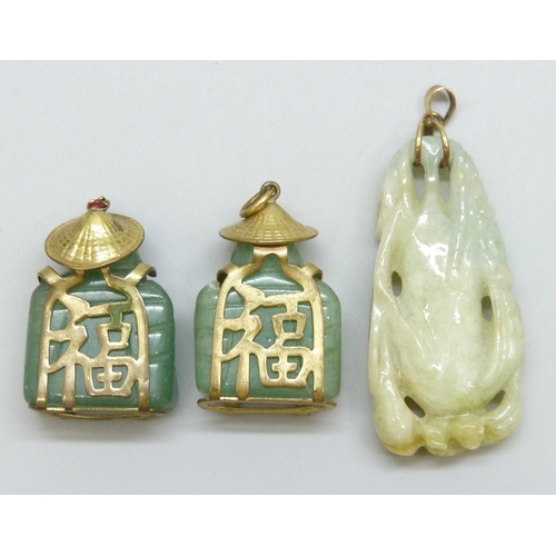 7060 - Three carved jade/jadeite pendants, largest 5cm including bail, 26g total