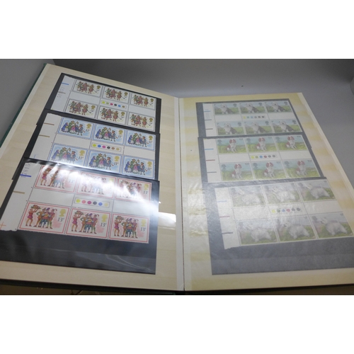 Stamps; a stockbook of GB traffic light gutter pairs