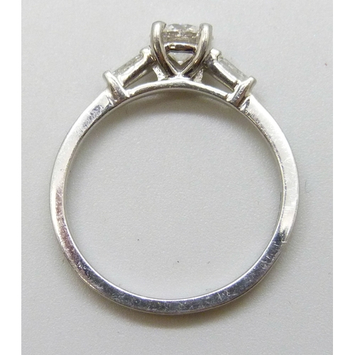 7181 - A platinum set diamond solitaire ring, approximately 0.5ct, 3.6g, L/M