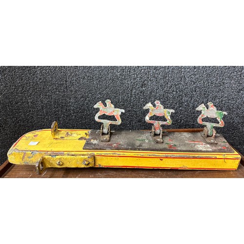 An early 20th Century hand painted fairground shooting target