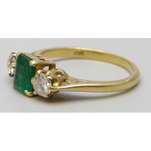 7131 - An 18ct yellow gold, emerald and diamond ring, 2.6g, I/J, band slightly misshapen
