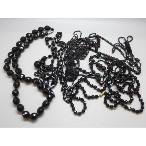 7247 - A collection of French jet necklaces