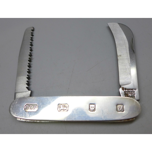 7332 - A silver mounted pocket knife with two blades - curved and saw, Rodgers, Sheffield, hallmarked Londo... 