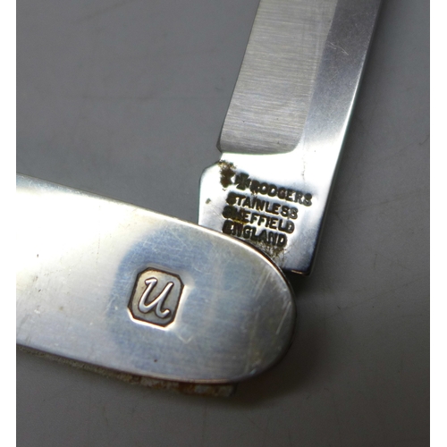 7332 - A silver mounted pocket knife with two blades - curved and saw, Rodgers, Sheffield, hallmarked Londo... 