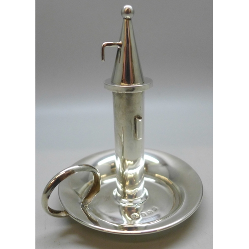 7349 - A small Edwardian silver candlestick holder and snuffer, creased, Birmingham, 1907, 25g, 6.9cm base