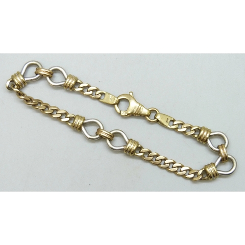 7003 - A 9ct gold fancy link curb chain bracelet, hallmarked, 15.4g, 18.8cm