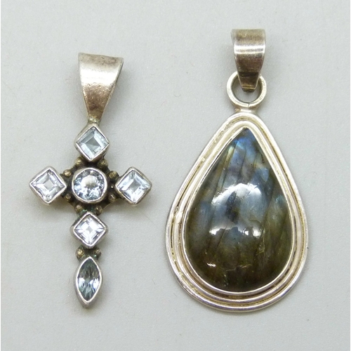 7064 - Two silver and gemstone necklace pendants including a topaz set cross, and a labradorite example, 3.... 