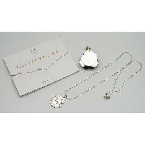 7068 - An Oliver Bonas silver heart design bracelet, and a white metal Leo Zodiac pendant on a silver chain... 