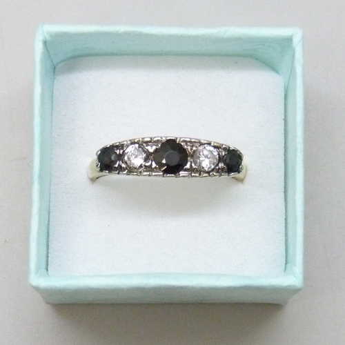 7076 - A silver gilt sapphire and cubic zirconia ring, W