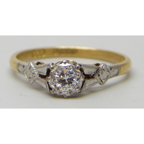7082 - An 18ct gold and platinum diamond solitaire ring, 2.2g, N