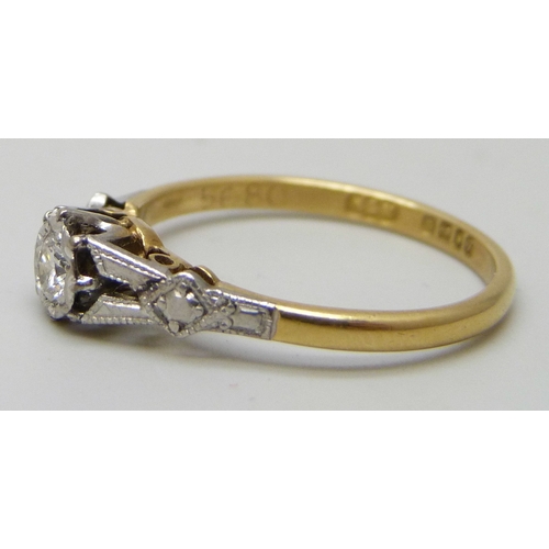 7082 - An 18ct gold and platinum diamond solitaire ring, 2.2g, N