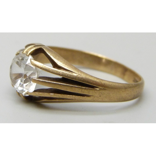 7085 - A 9ct gold white stone solitaire ring, testing as possibly sapphire, 2.8g, P