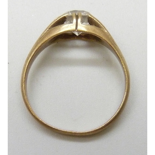 7085 - A 9ct gold white stone solitaire ring, testing as possibly sapphire, 2.8g, P