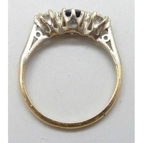 7086 - An 18ct gold and platinum blue stone (possibly topaz) and diamond ring, 2.3g, J