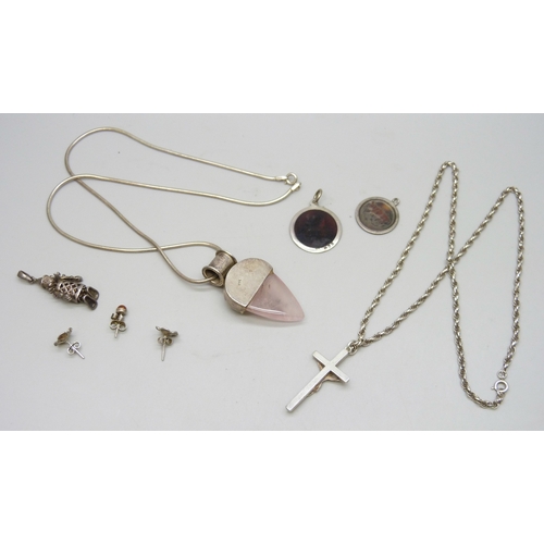 7088 - A silver rope chain necklace with a white metal cross pendant, and other silver and white metal jewe... 