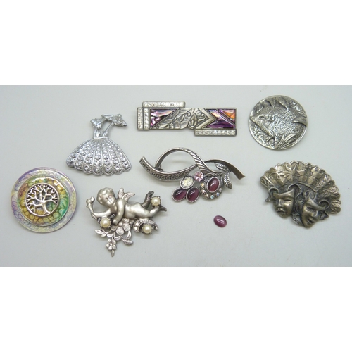 7090 - A collection of brooches including some signed, one cabochon glass stone loose