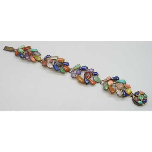 7108 - A Chinese export gilt metal gemstone set bracelet including lapis lazuli, rose quartz, turquoise and... 