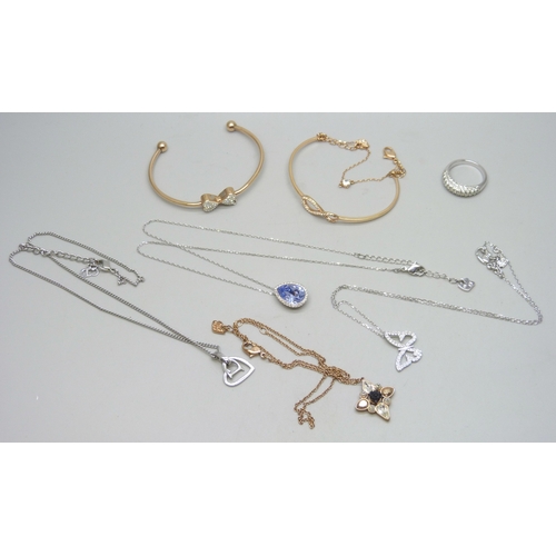 7116 - A Christian Dior heart design necklace, and Swarovski jewellery, together with an unmarked torque ba... 