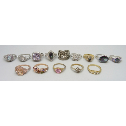7117 - A collection of costume rings, and four marked 925 (22g)