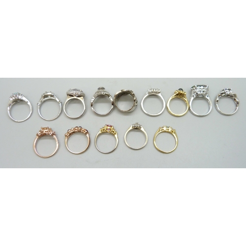 7117 - A collection of costume rings, and four marked 925 (22g)