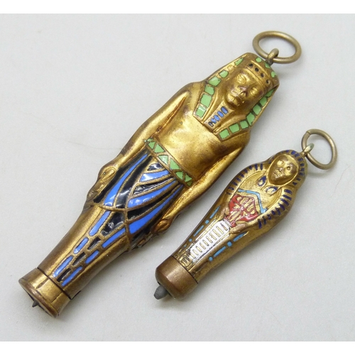 7118 - Two Egyptian sarcophagus pendant propelling pencils, largest 6.4cm