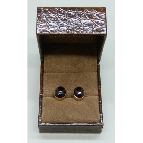 7122 - A pair of early 20th century 15ct gold and cabochon garnet earrings, with 9ct gold butterflies, 3.9g