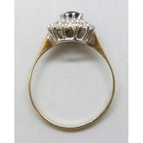 7127 - A 9ct gold, sapphire and white stone cluster ring, 2g, R