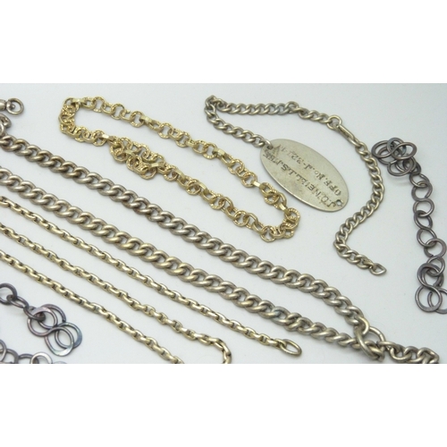 7149 - A collection of Alberts, chains, etc.