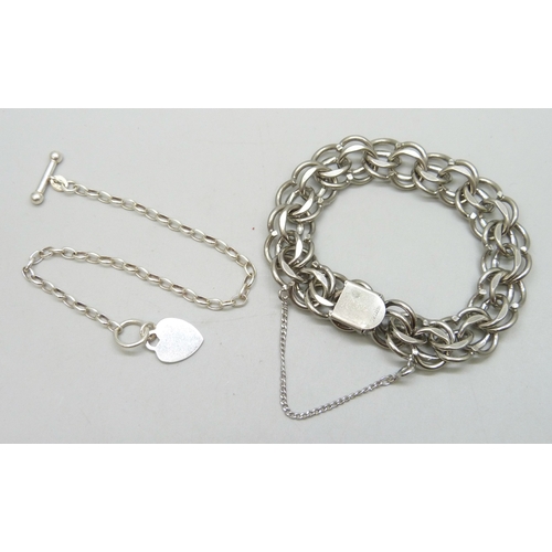 7157 - A bracelet marked 'Rhythm Sterling' and a silver bracelet with heart tag, 42g total
