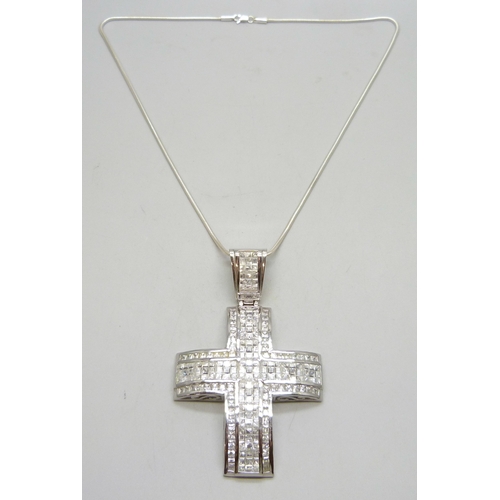7170 - A large silver stone set cross pendant, on a silver chain, 83g total, 10cm including bail