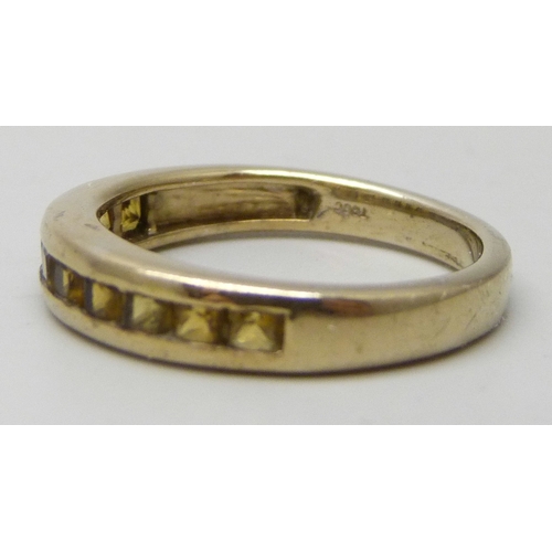 7175 - A silver gilt yellow tourmaline band ring, P/Q, and certificate